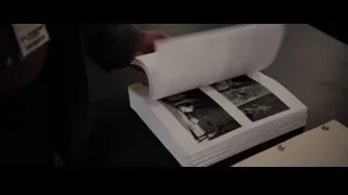 bearded man standing by piano in dim room — Steve Jobs