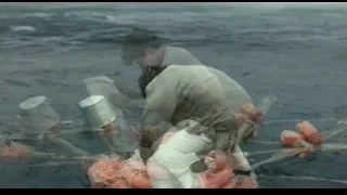 man fishing on boat in choppy ocean — Life of Pi