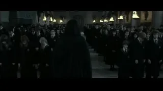 Children in robes walking in arched hall — Harry Potter and the Deathly Hallows 2