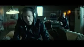 young man sleeping on couch — John Wick