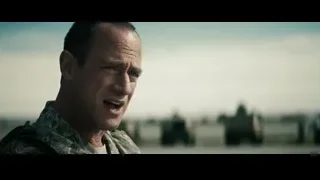 man in camouflage jacket at military base — Superman: Man of Steel