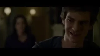 Woman in deep thought, man watching — The Amazing Spider Man