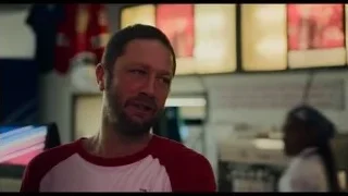 Man in red t-shirt with serious expression — The Bear