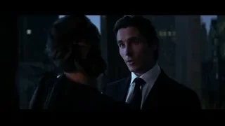 man and woman with city skyline — Batman: The Dark Knight