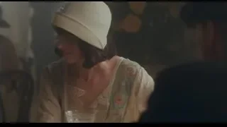 Woman sitting at table with glass of water — Peaky Blinders