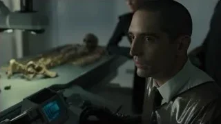 man in laboratory with skeletons — Blade Runner 2049
