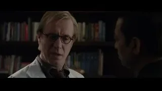 two men in lab coats with bookshelves — The Amazing Spider Man
