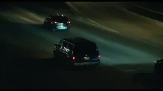 night view of city skyline with cars — The Bear