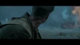 Injured man in front of raging fire — Hacksaw Ridge