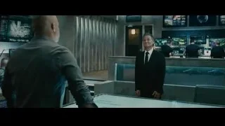 two men talking in control room — Furious Seven