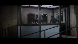 man standing at control panel — Bruce Lee: Enter The Dragon