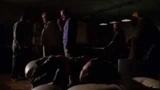 Five men around unconscious person on couch — Breaking Bad