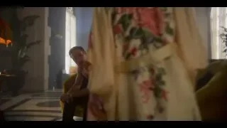 shirtless man on couch deep in thought — Peaky Blinders