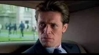 man in car looking at people on street — Spider Man