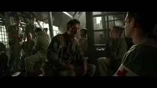 Men in military uniforms in room with blood — Hacksaw Ridge