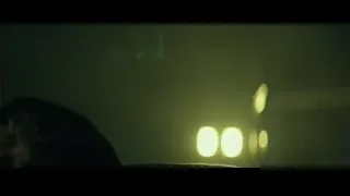 man with closed eyes in dark room — John Wick