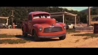 Red pickup truck parked on desert road — Cars 3