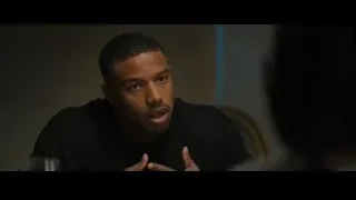 young man in sweater deep in thought — Creed 2