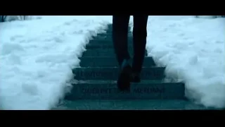 Person walking up snow-covered stairs — John Wick: Chapter 4