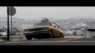 Yellow taxi cab parked on street — The Persuit of Happyness