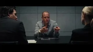 three people in serious meeting conversation — Now You See Me