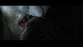 man with beard in dark cave — Batman