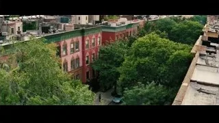 people walking past building mural — The Secret Life of Walter Mitty