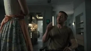 Man with cigarette and woman in floral dress — Blade Runner 2049
