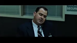 Man in suit in front of Anti-Security sign — Fight Club