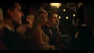 group of people in dimly lit formal room — Peaky Blinders