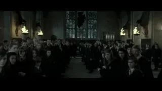 Young people in church hallway with stained glass — Harry Potter and the Deathly Hallows 2