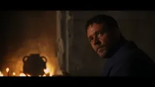 man deep in thought by fireplace — Gladiator