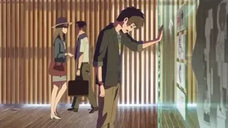 young man with phone in hallway — Your Name