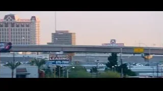 highway with traffic and large billboard — The Big Short