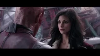 woman looking at man in red mask — Deadpool