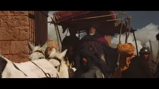 Man with turban leading horse cart — Gladiator