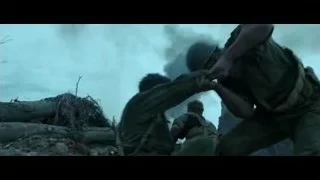man carrying wounded woman on his back — Hacksaw Ridge