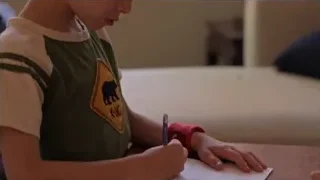 young boy drawing at living room table — Screened Out