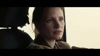 woman in car with serious expression — Interstellar