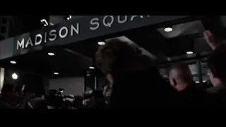 man in suit standing in hallway — Southpaw