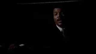 close-up of man's face in dark — Rocky III