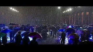 people walking in rain with umbrellas — Now You See Me 2
