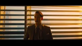 Young man with cigarette by window blinds — John Wick: Chapter 4