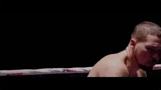 Shirtless man with tattoo in boxing ring — Creed