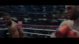 two men fighting in boxing ring — Creed 2