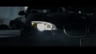 Black cars parked in dimly lit lot — The Amazing Spider Man