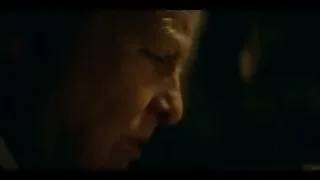 hands holding whiskey glass in dim room — Peaky Blinders