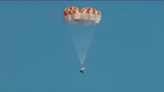 two parachutes flying with smoke trail — Elon Musk: Return to Space
