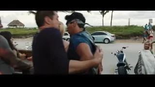man standing in front of a large robot — Iron Man 3