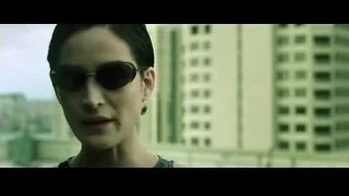 woman's face with black sunglasses — The Matrix